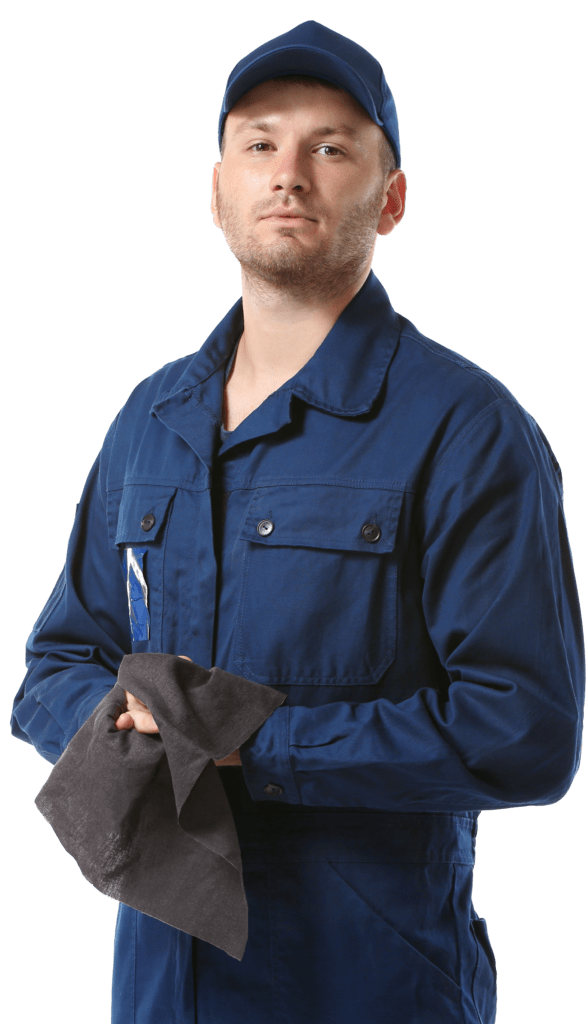 A mechanic in a blue coverall holds a gray cloth, looking confidently at the camera. This image emphasizes professionalism in the automotive industry.